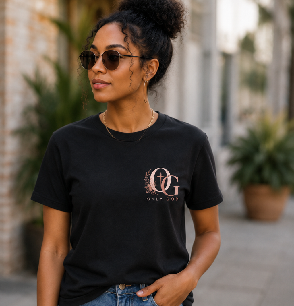 Woman with high bun wearing God Don’t Play About Me OG shirt