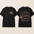 She Is Strong in God and Unstoppable front and back black T-shirts shown in standardized Large fit